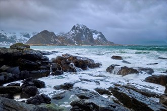 Rocky coast of fjord of Norwegian sea in winter. Skagsanden beach
