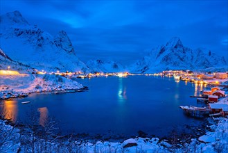 Reine village illuminated at night. Lofoten islands