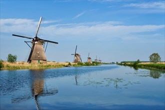 Netherlands rural landscape with windmills at famous tourist site Kinderdijk in Holland