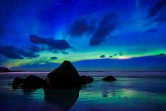 Aurora borealis northern lights on Skagsanden beach. Lofoten Islands