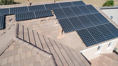 Solar panels installed on roof of large house