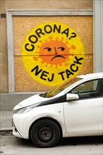 Corona - no thanks. Graffiti on a house wall. Sweden
