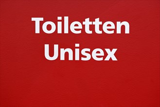 Lettering toilets unisex