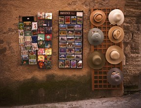 Souvenir shop with postcards and sun hats
