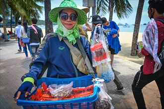Thai woman selling inca-peanut