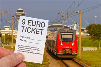 9-euro ticket with regional train Regional train photo montage in Munich