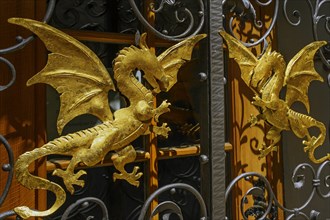 Two golden dragons at the entrance gate