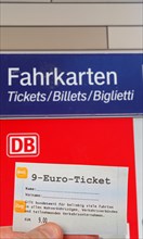 9-euro ticket with ticket vending machine photo montage in Stuttgart