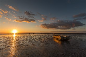 Sunset over the mudflats at low tide at Holmersiel