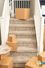 Abstract of stairs with new carpets and moving boxes