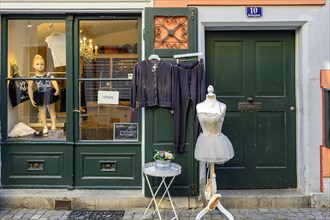 Tailor's shop with shop window and tailor's dummy