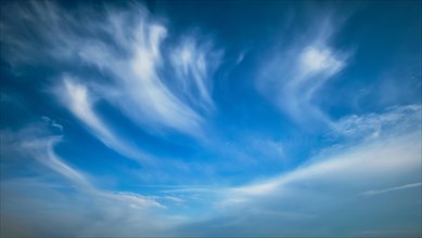 Blue sky with whie Cirrus clouds background texture