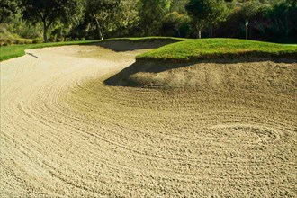 Abstract of golf course and sand bunker