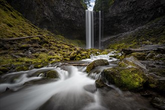 Waterfall cascading over rocky outcrop