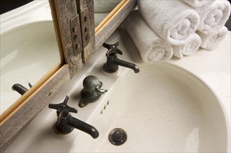Rustic bathroom sink and mirror