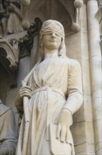 Figure of the Synagoga on the facade of Saint-Etienne Cathedral or St. Stephen's Cathedral