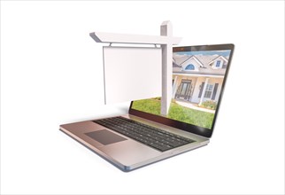 Blank real estate sign popping out of computer laptop screen isolated on a white background