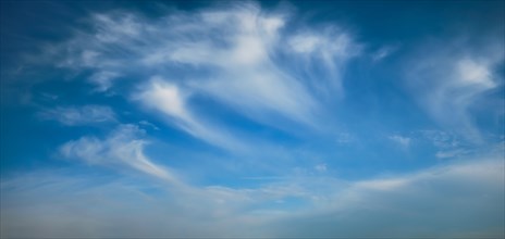 Blue sky with whie Cirrus clouds background texture