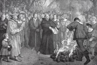 Martin Luther burning the papal bull outside Wittenberg on 10. 12. 1520