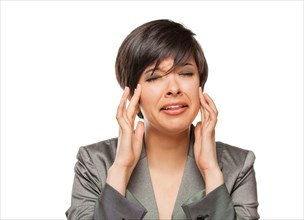 Grimacing biracial girl holding her head with her hands isolated against white background