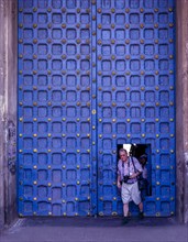 A tourist crossing the Main door in Varadarajaswamy temple
