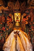 Maitreya Buddha statue close up Tibetan monastery Thiksey Gompa. Ladakh
