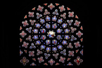 Rose window of the south transept with 19th century leaded glass windows