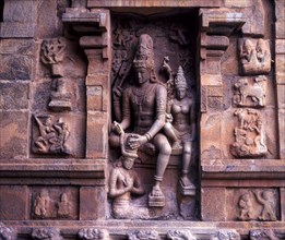 11th Century Sculpture of Sandesa Anugrahamurthy on the exterior wall of Siva Temple in Gangaikondacholapuram