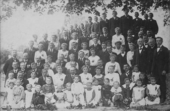 Group portrait of an extended family at a family celebration