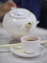 Having tea in a Chinese restaurant