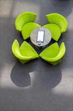 Arrangement of coloured club chairs in the restaurant
