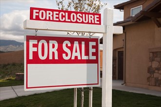 Foreclosure for sale real estate sign in front of house ready for your own copy