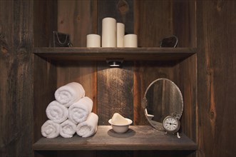 Rustic spa scene with towels