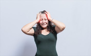Woman with headache on isolated background