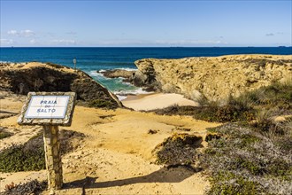 Sign on the coast