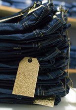 Close up of blue jeans on others with copy space