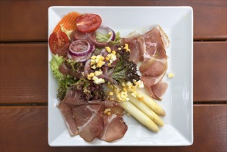 Asparagus salad with ham served in a Franconian inn