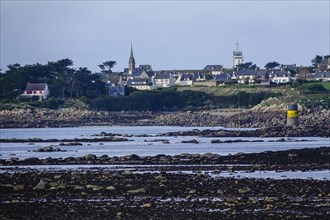 View at low tide from Roscoff to the island Ile de Batz with church