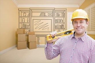 Male construction worker wearing hard hat in room with drawing of entertainment unit on wall
