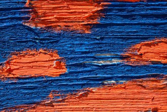 Old blue and orange painted wood wooden planks texture close up background