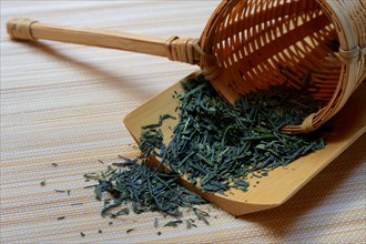 tea in bamboo strainer