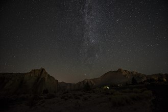 Canyon in front of night sky