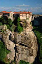 Monastery of Varlaam monastery in famous greek tourist destination Meteora in Greece on sunset with scenic scenery landscape