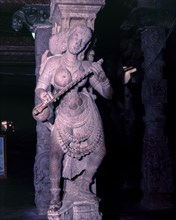 Statue of woman playing a veena in 1000 pillared hall in Sri Meenakshi temple