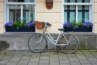 Bicycle parked near the house in the Hague