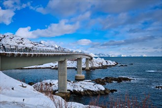 View of Djupfjord Bridge Djupfjordbrua over the fjord in winter