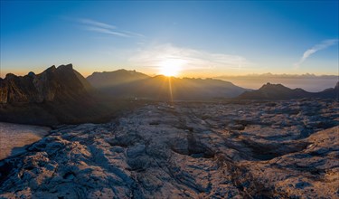 Aerial view over the glacier foreland of the Zanfleuron glacier with rising sun