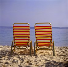 Deck chairs on the beach Island Skiathos Greece Deck chairs on the beach Island Skiathos Greece
