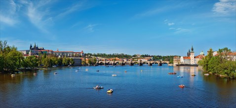 Panoramic view of Vltava river with catamaran pedal boats