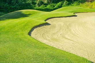 Abstract of golf course and sand bunker
